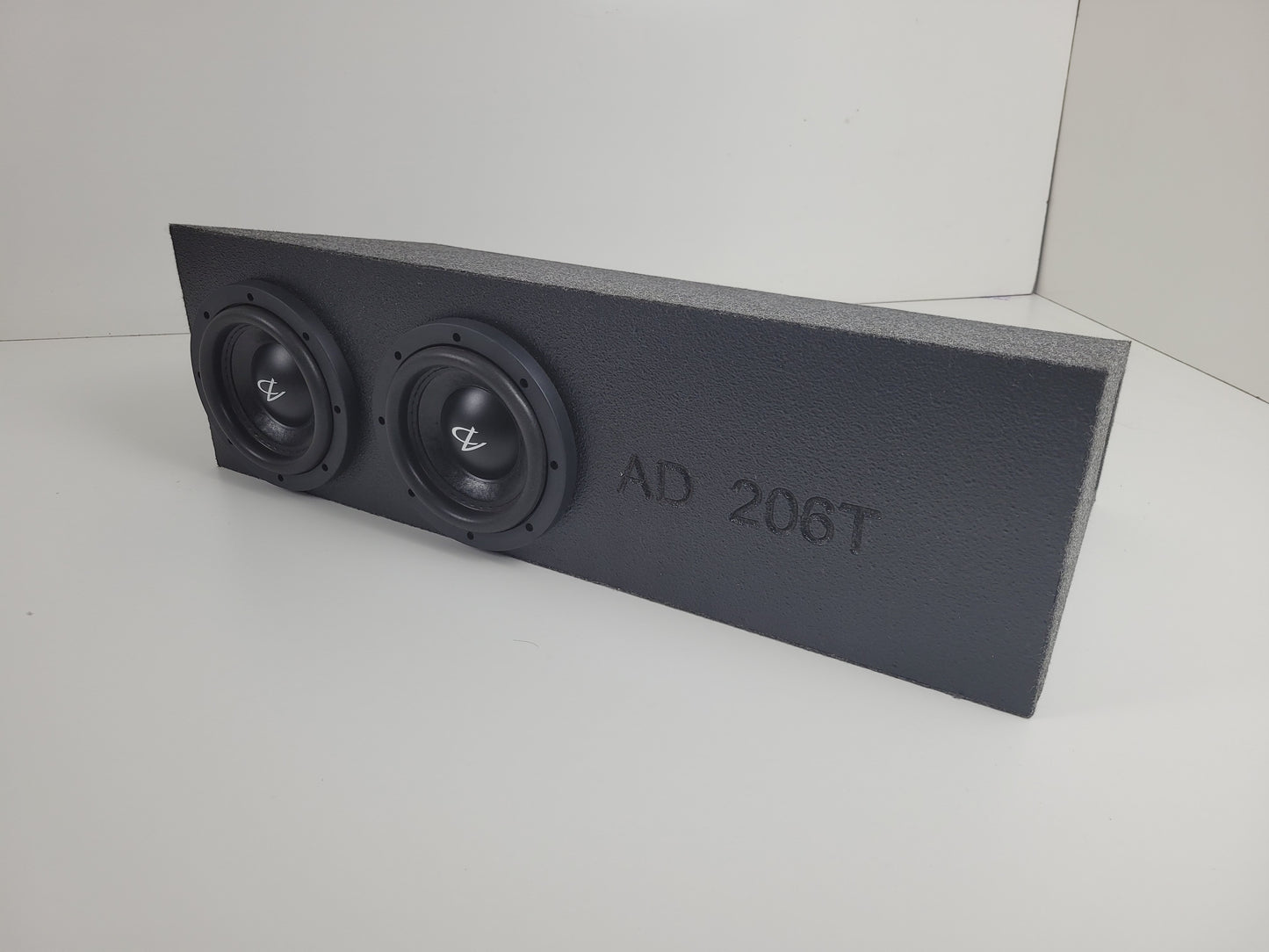 Dual 6.5" Audio Dynamics in ported under seat box.